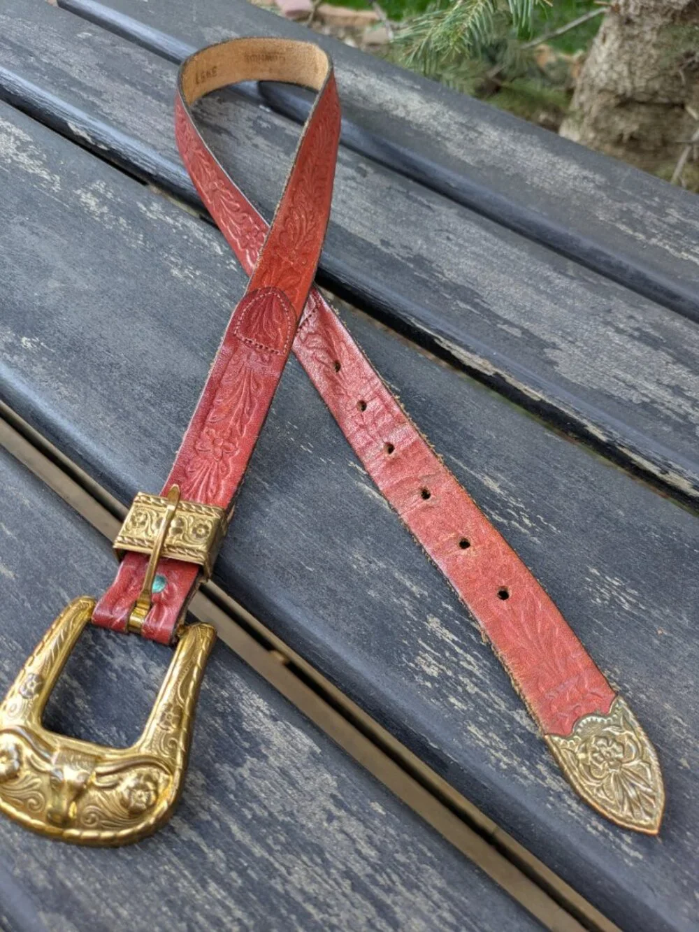 Vintage Western ranger-style leather belt with red finish & gold-tone hardware.